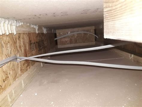 attaching junction boxes to rafters|running wire across rafters.